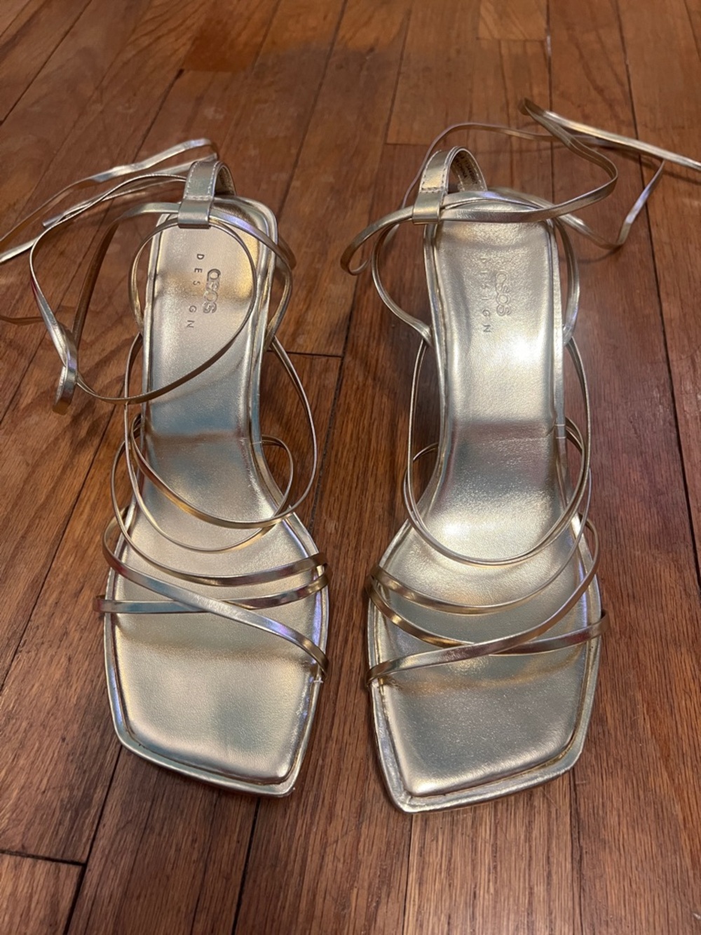 ASOS Design Hoola Strappy tie leg mid heeled sandals in gold